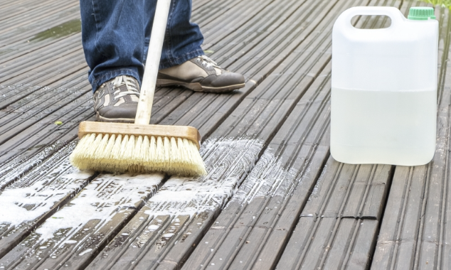Scrubbing a wooden deck