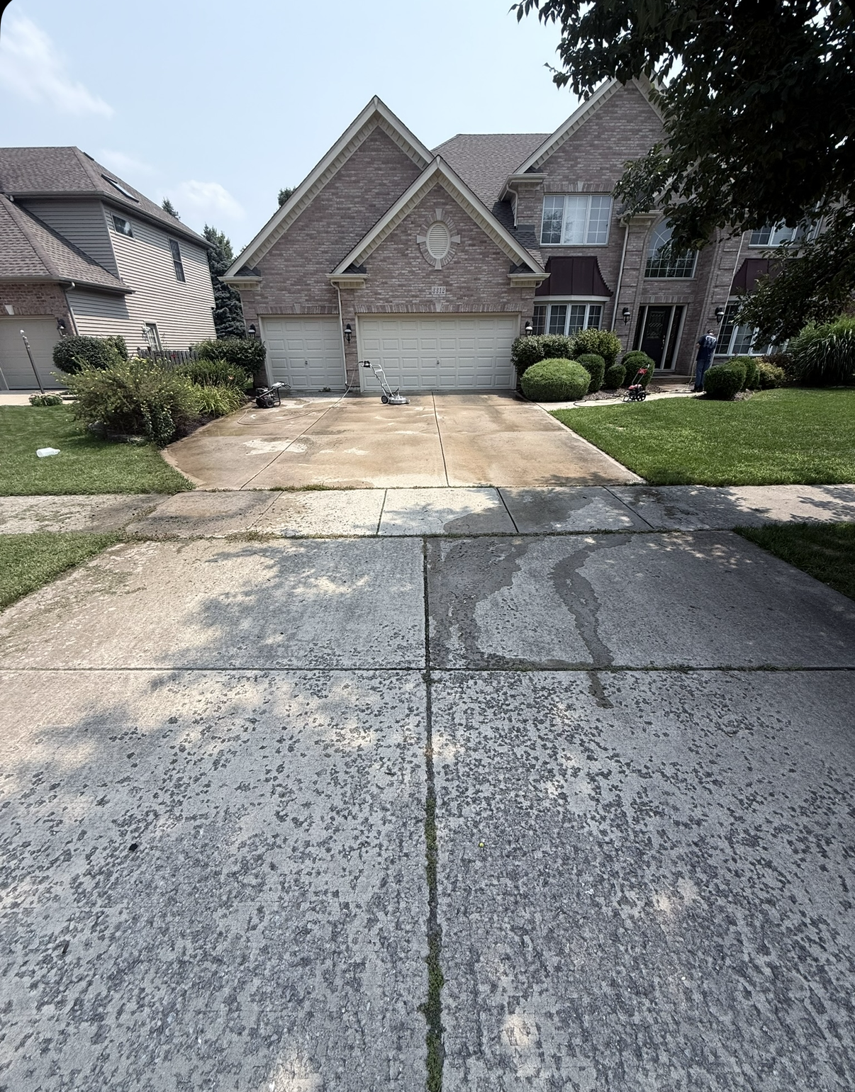 Driveway before pressure washing